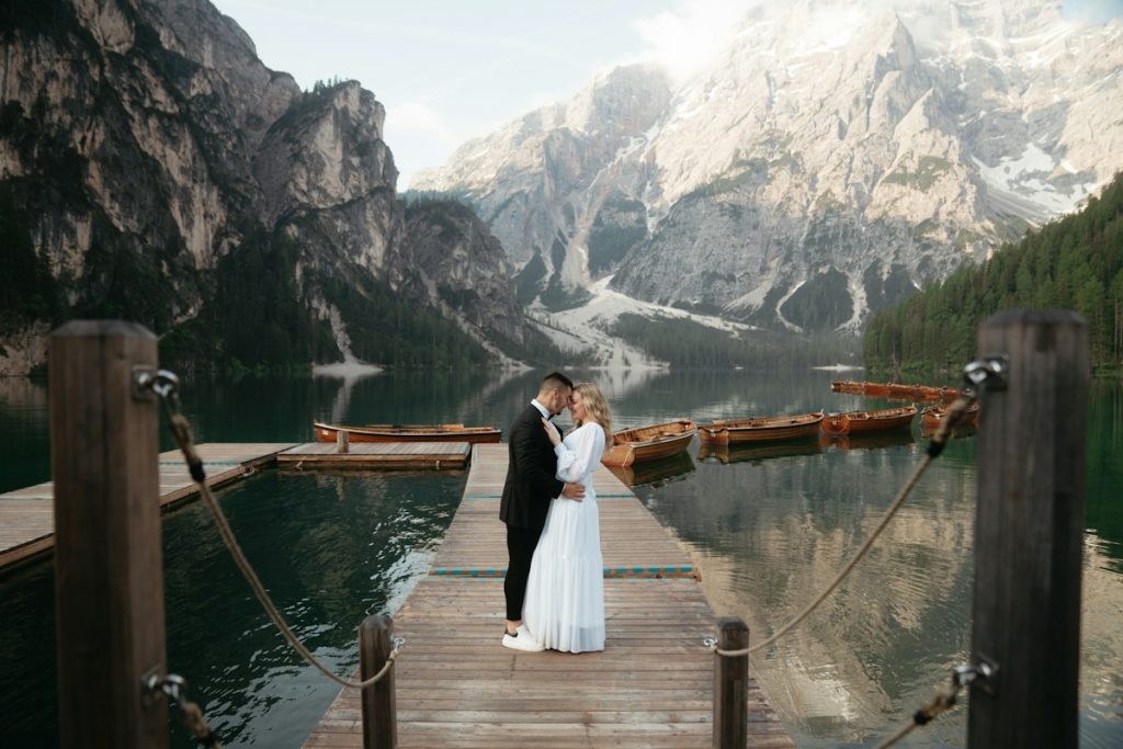 A bride and groom standing together outdoors